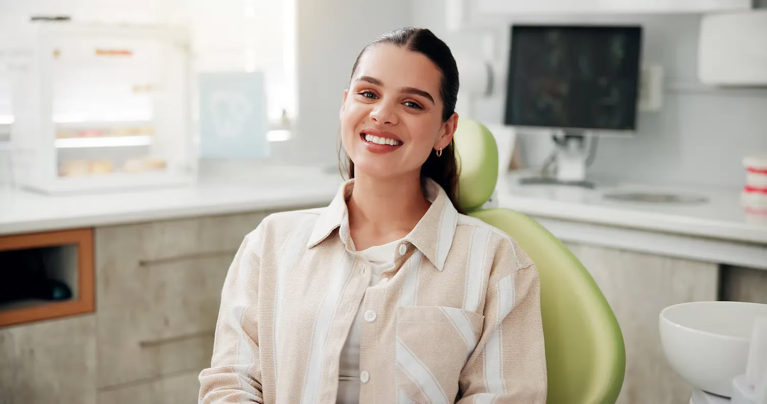 Smiling patient relaxed in the dental chair
