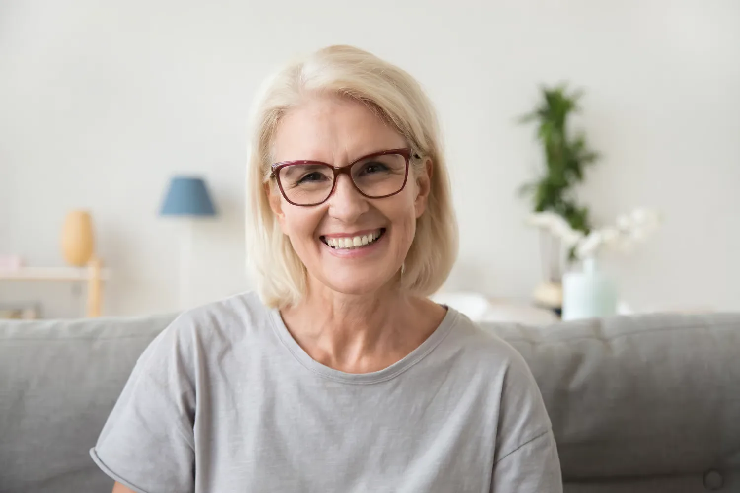 Smiling patient relaxing at home